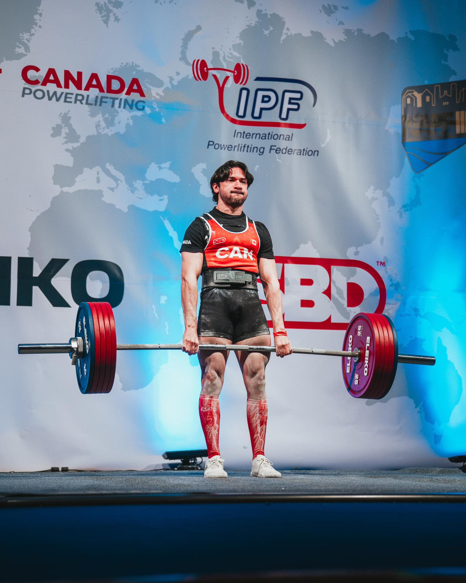 Jared James representing Canada in international powerlifting competition